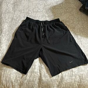 Nike Dri-Fit men’s medium running shorts with liner and side pockets